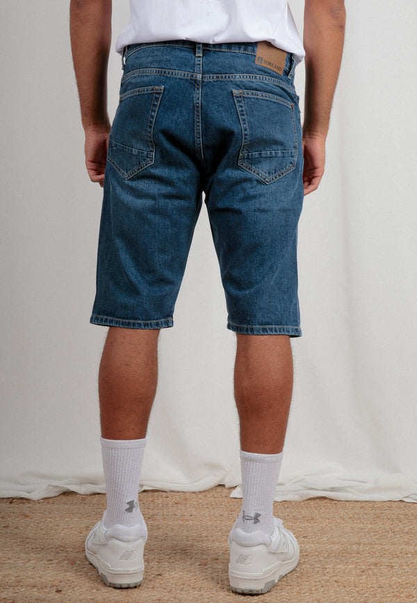 SHANE | Sustainable denim shorts for men made from 100% organic cotton in mid indigo 