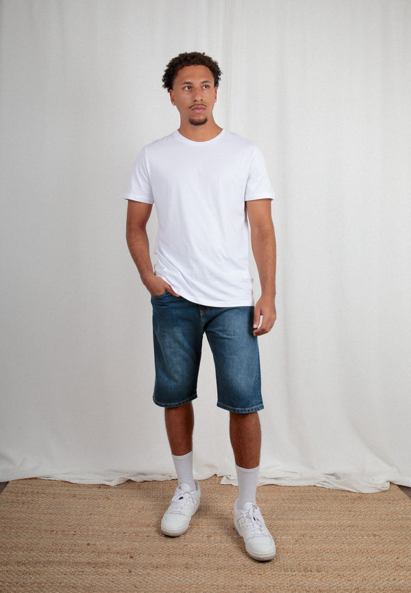 SHANE | Sustainable denim shorts for men made from 100% organic cotton in mid indigo 